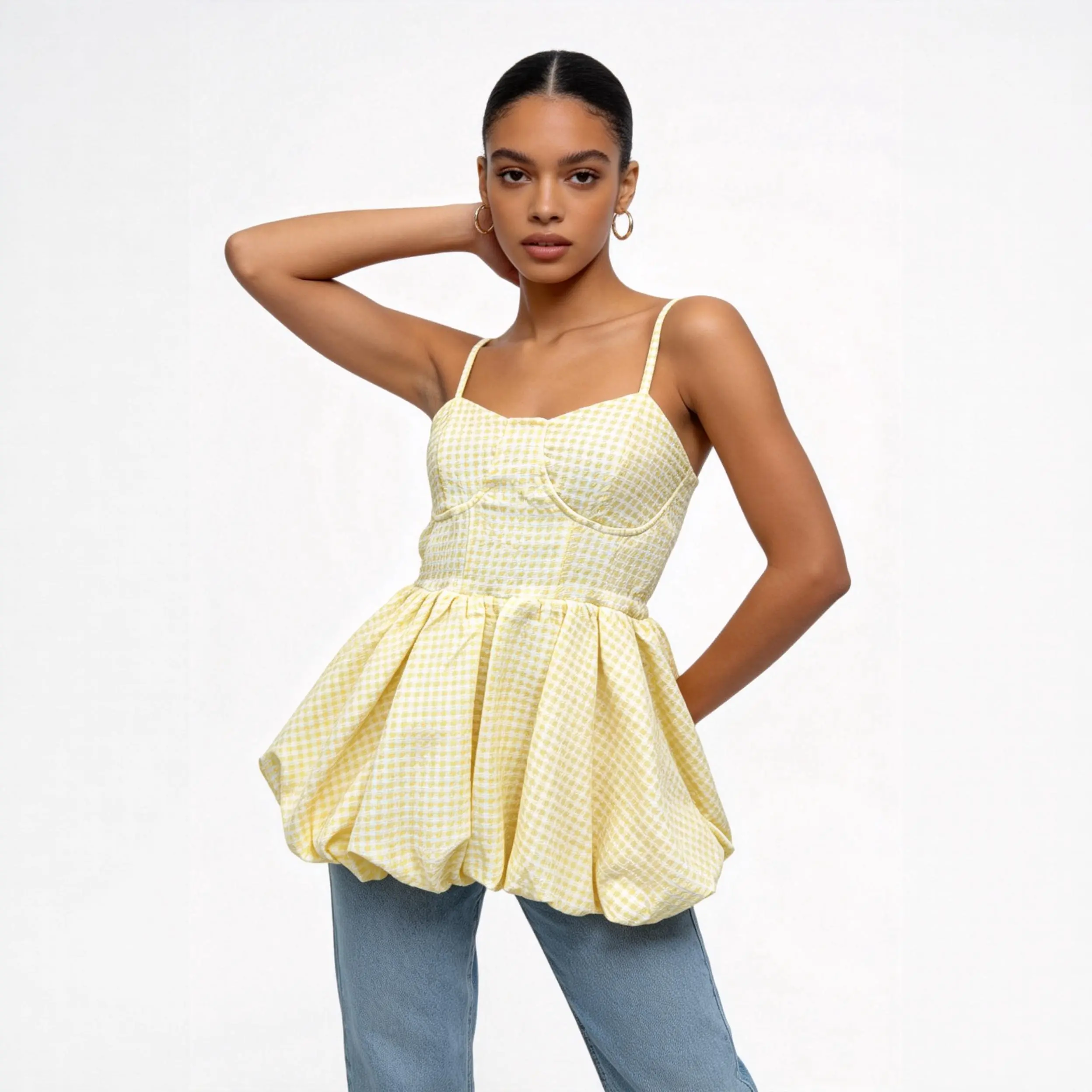 Gathered Waist Detail – Yellow Gingham Bubble Hem Dress Close-up of gathered waist seam on yellow textured gingham dress
